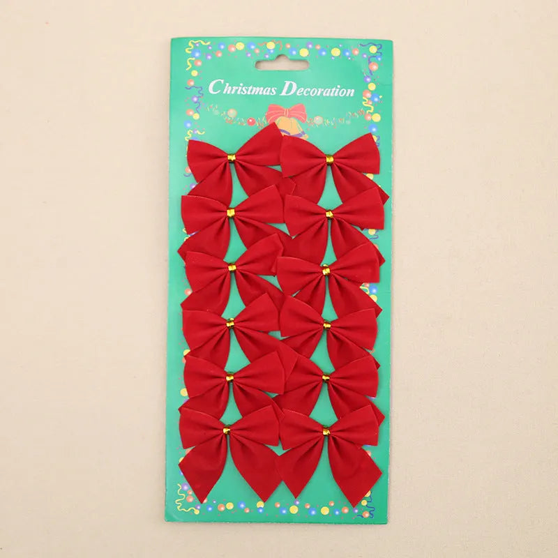 Red, gold, red gold, and silver 5 cm polyester Christmas decoration bows on a tree branch