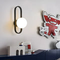 Modern minimalist wall lamp with glass shade and iron mount in black or gold finish