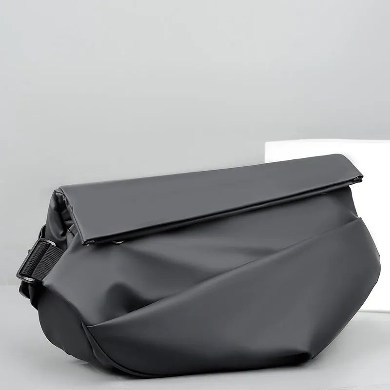 Grey men's medium PU leather crossbody sling bag with zipper and shoulder strap.