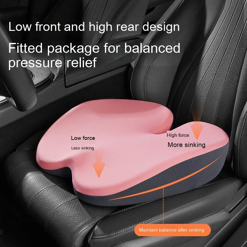 Ink black car seat cushion and lumbar support set on a driving seat.