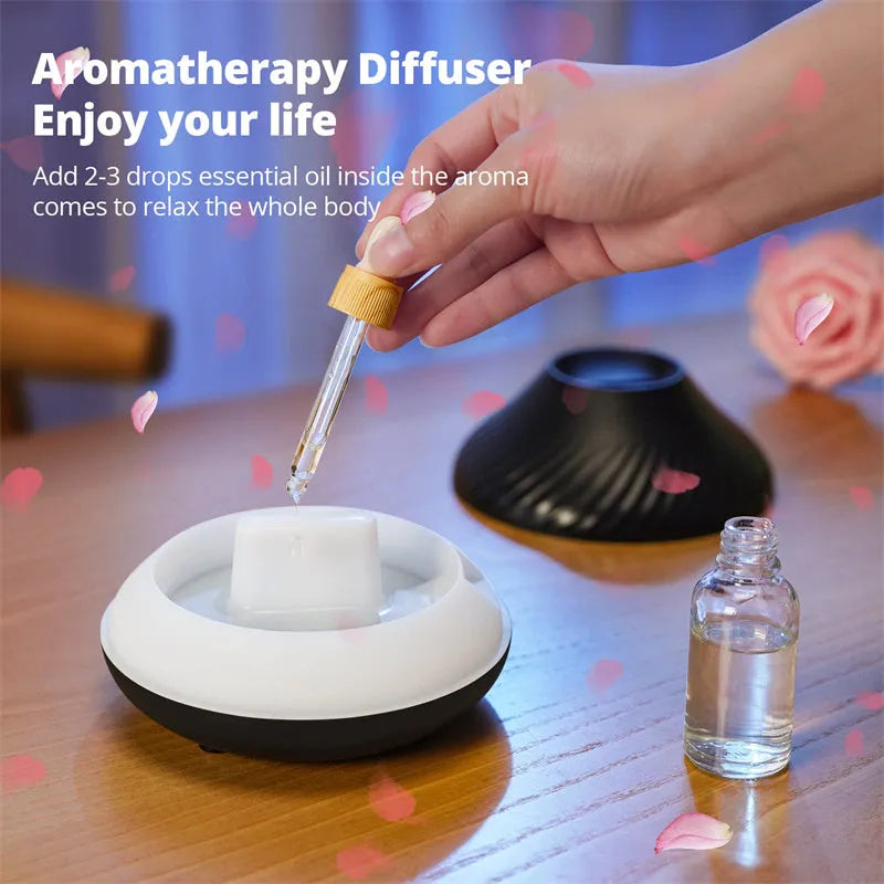 Beige and black USB-powered aroma diffuser with colour-changing LED light and water mist output