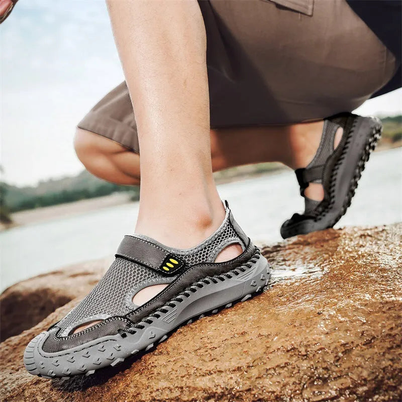 Men's casual sandals with breathable mesh upper and Velcro strap in black, brown, and grey.