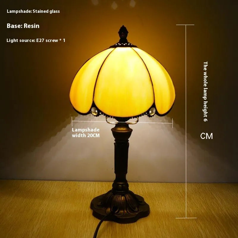 Beige bedside table lamp with simple modern design measuring 20cm wide