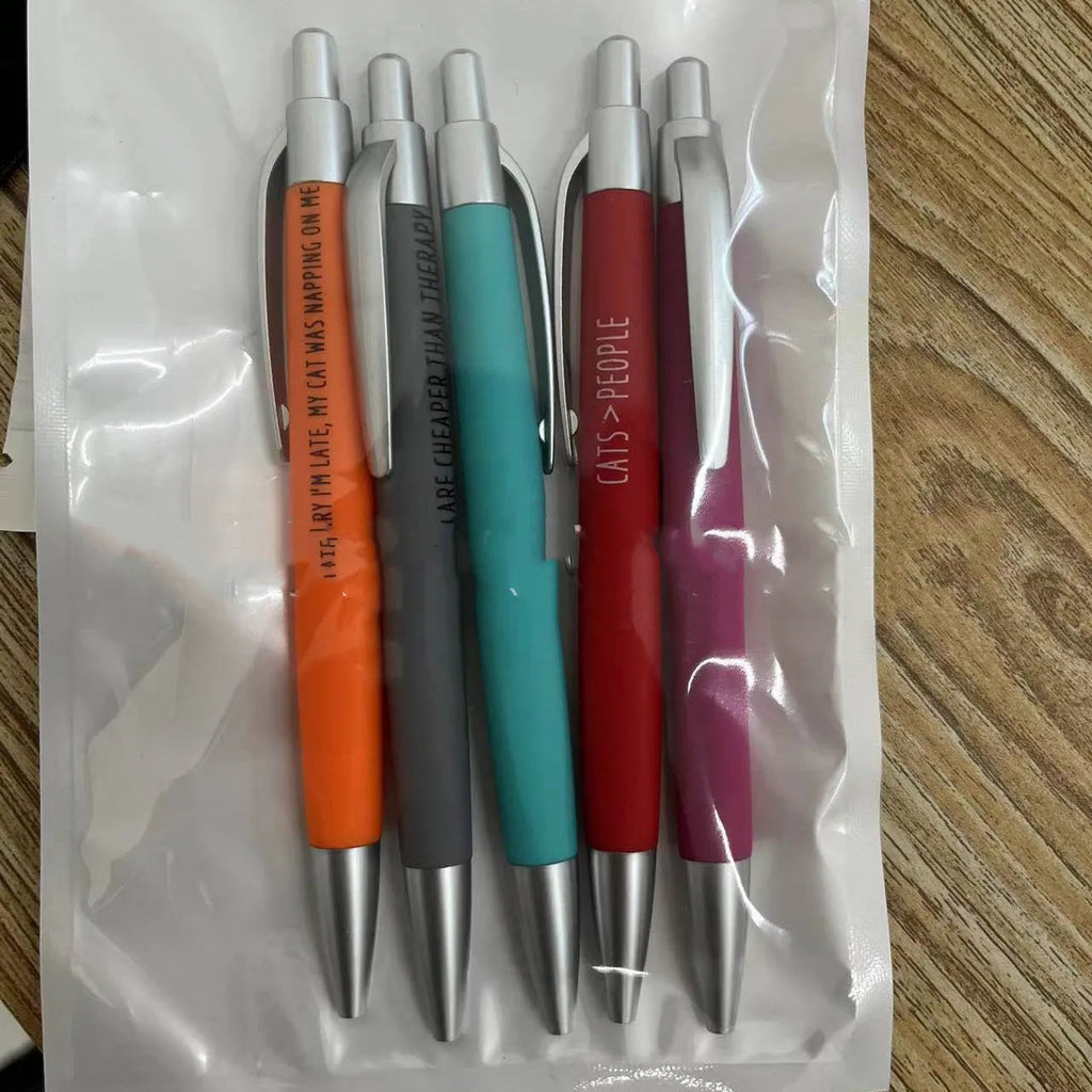 Set of five push-action automatic pens with cat and dog design refills in beaded storage bag