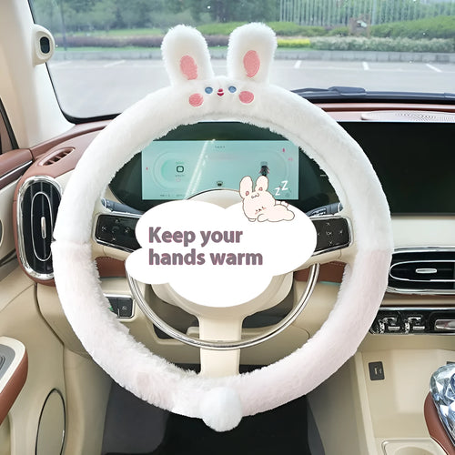 Plush winter steering wheel cover with embroidered bear design, shown on a car steering wheel.