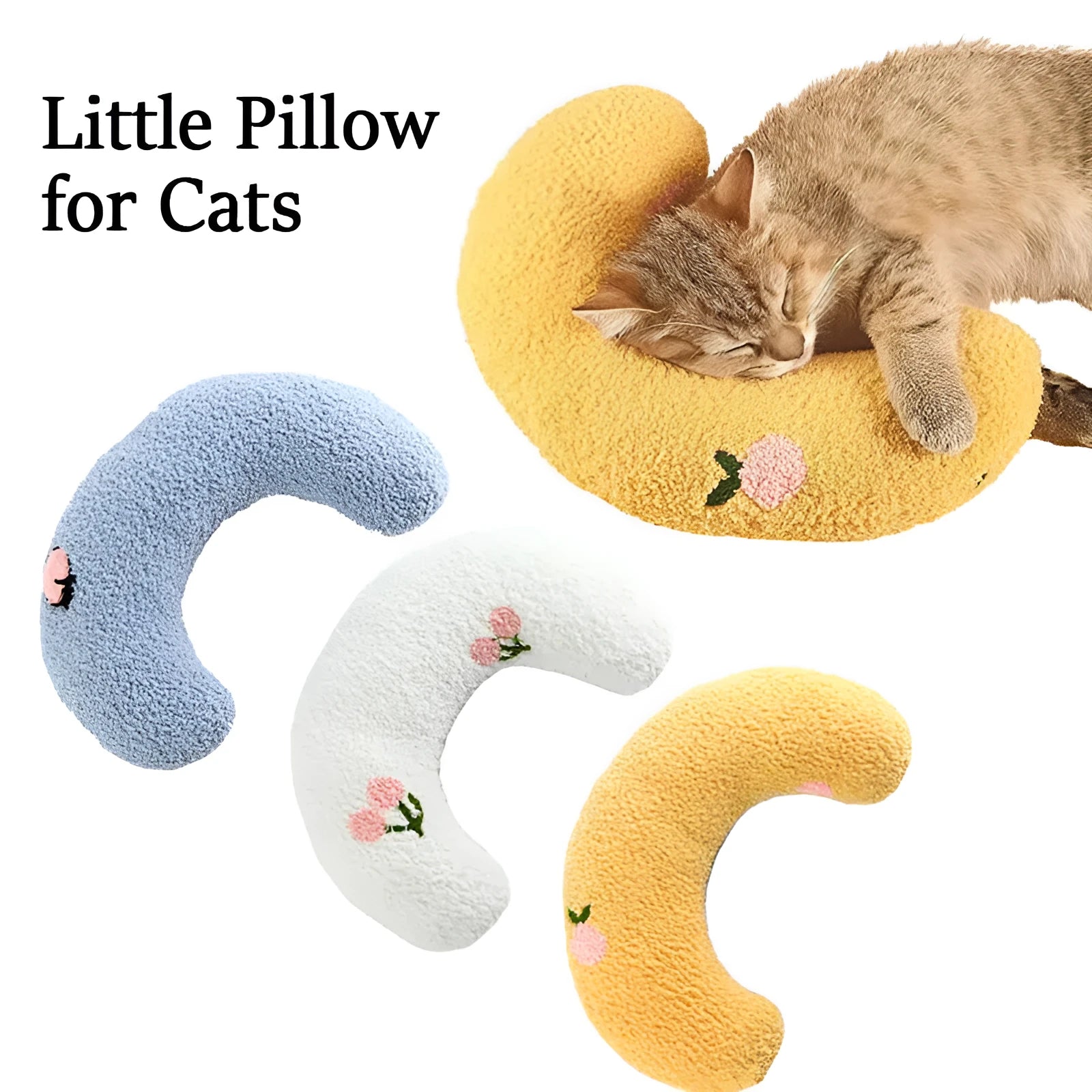 Small white U-shaped plush pillow for a cat or small dog, showing its half-donut shape with a raised rim.