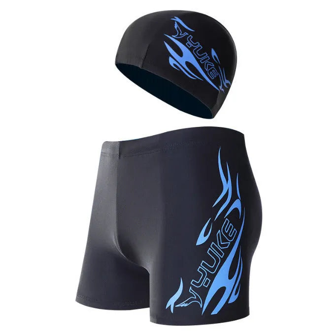 Men's plus size swim trunks with flame pattern and matching swimming cap on a black background.