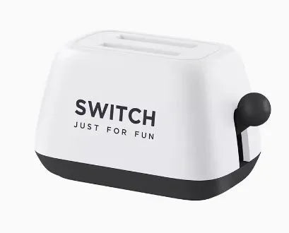 Green Switch game card storage box with silicone base on a table