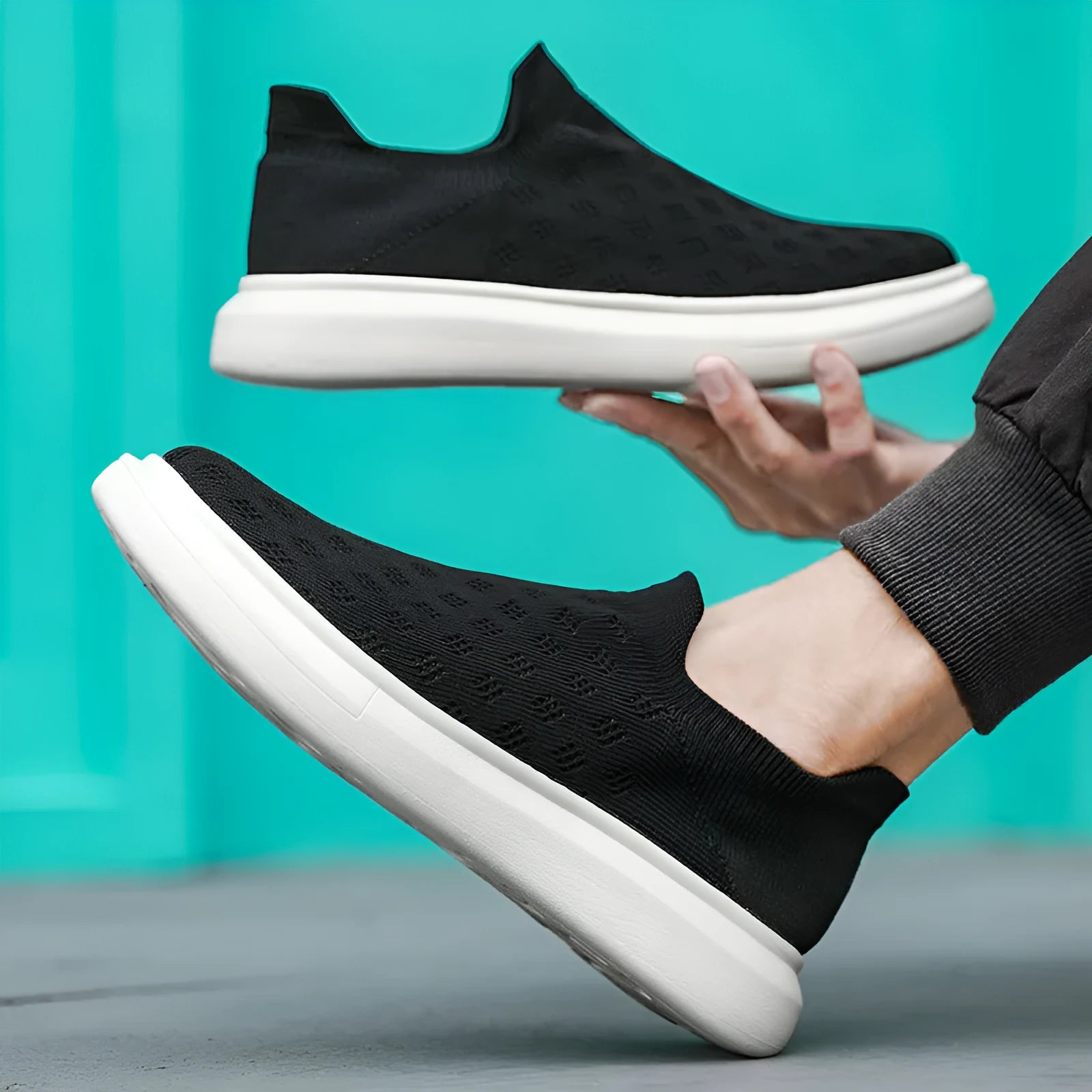 Men's mesh casual breathable solid colour sneakers shown in black colourway