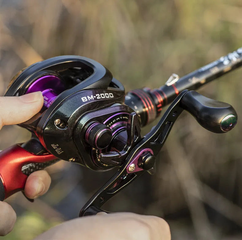 Colourful BM2000 size fishing reel with water drop wheel and magnetic brake system.