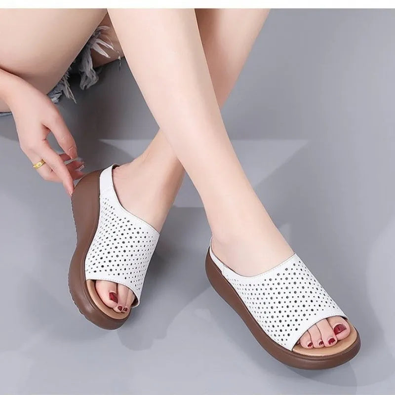Women's peep toe rocking bottom platform heel slippers in beige with ethnic pattern, PU upper and rubber sole