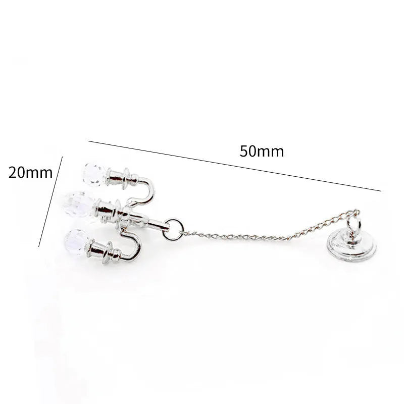 Mini metal retro ceiling light photo prop decoration in gold and silver, 5cm by 2cm.