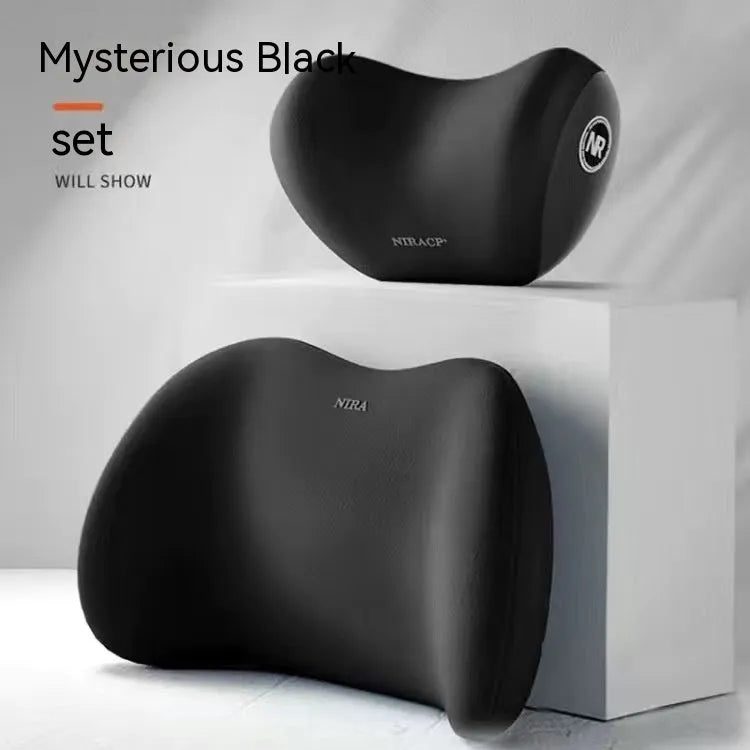 Black memory foam car headrest pillow and matching lumbar support pillow on a car seat.