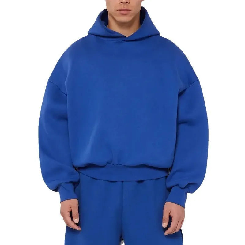 Men's solid colour fleece-lined cotton hoodie sweatshirt with a wool lining, shown in grey.