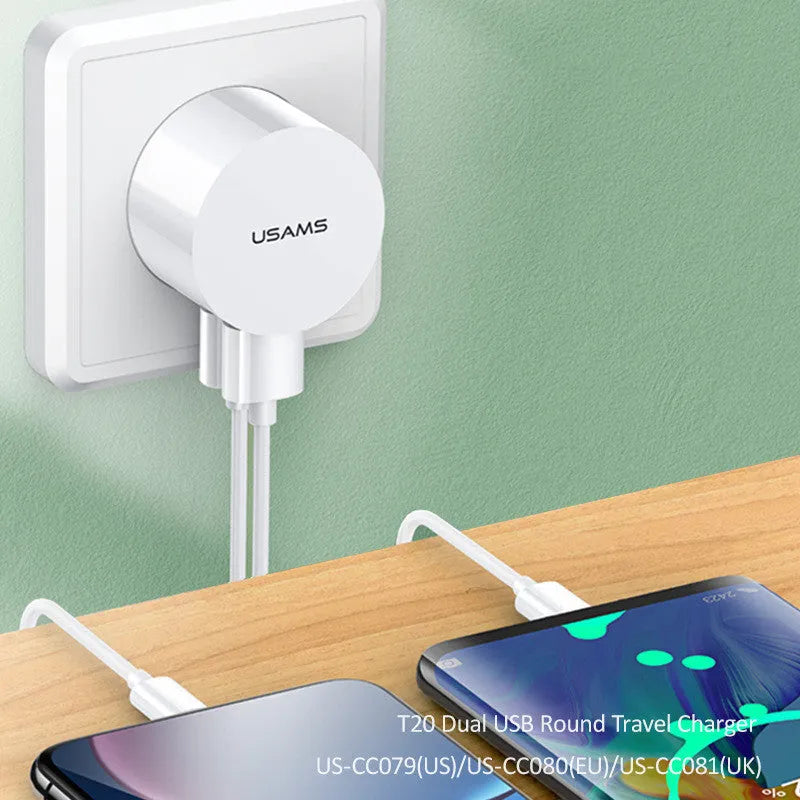 White portable universal dual USB phone charger with US EU UK plug compatibility and 39mm diameter