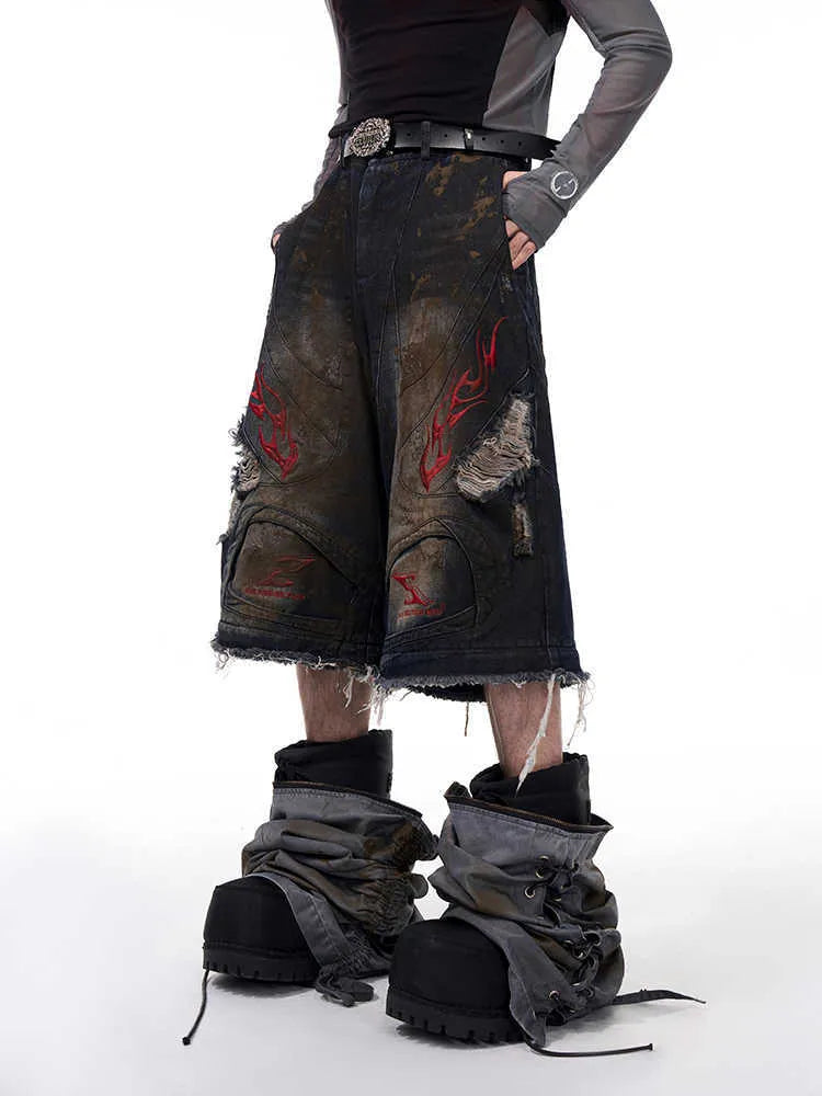 Men's loose fit retro jeans with detachable trouser legs in denim.
