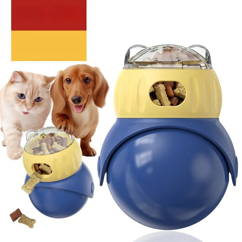 Yellow and blue Tumbler Owl interactive cat feeder toy on a wooden floor