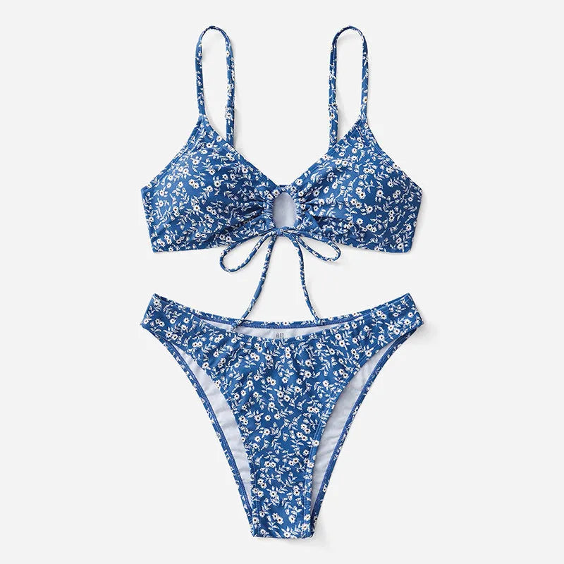 Blue polyester swimsuit three-piece set with top and shorts for swimming.