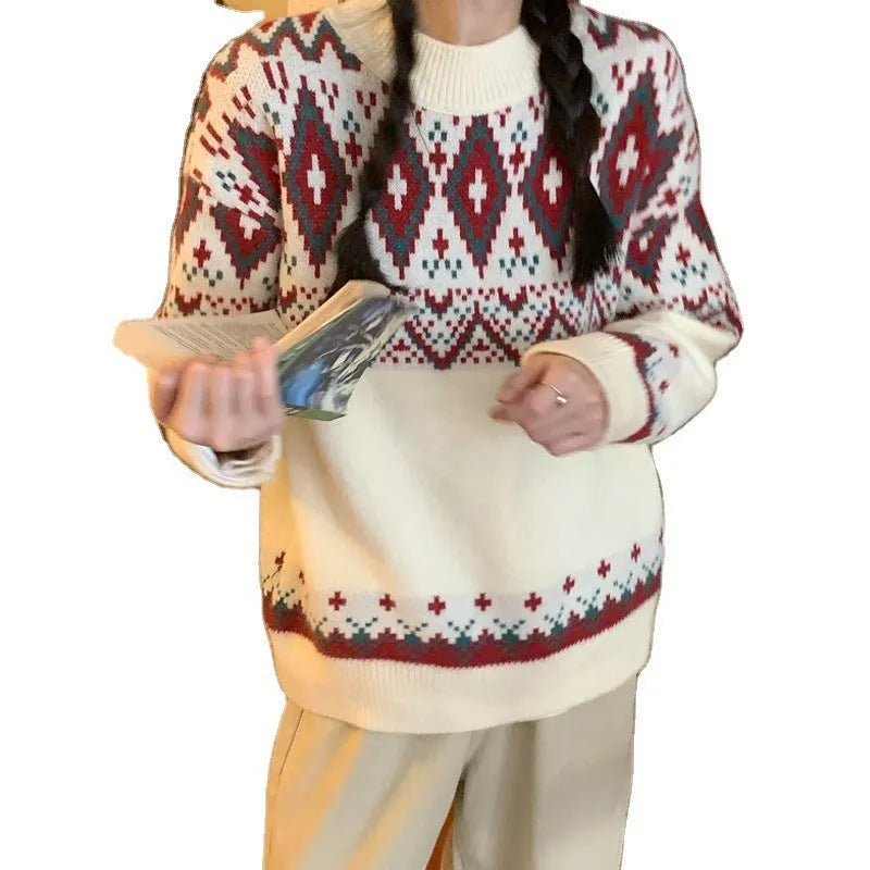 A loose-fitting striped knitted pullover top with long sleeves, shown in red and white colour options.