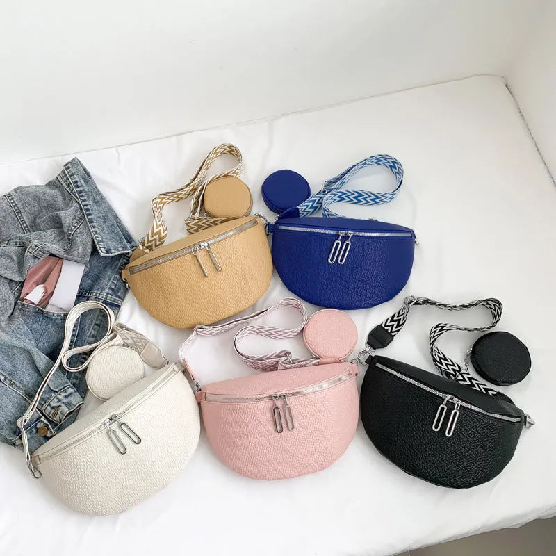 Solid colour women's crossbody bag with textured saddle lock zipper detail in a horizontal square shape