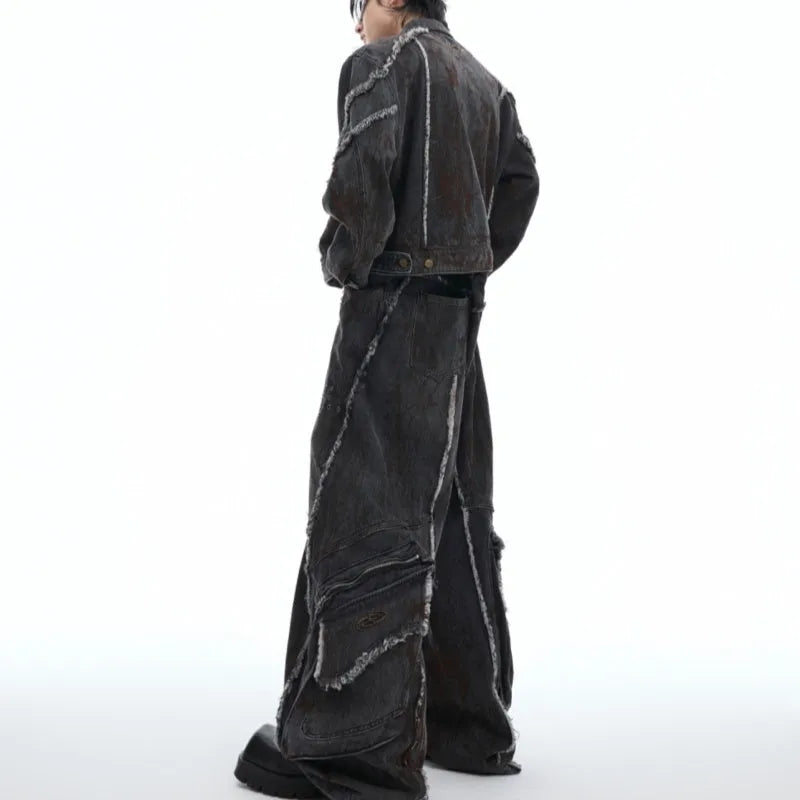 Black distressed denim coat and pants set with padded shoulders and gradient dye pattern