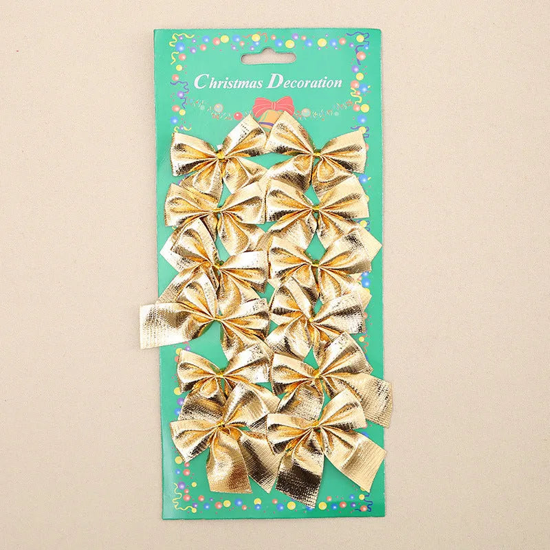 Red, gold, red gold, and silver 5 cm polyester Christmas decoration bows on a tree branch