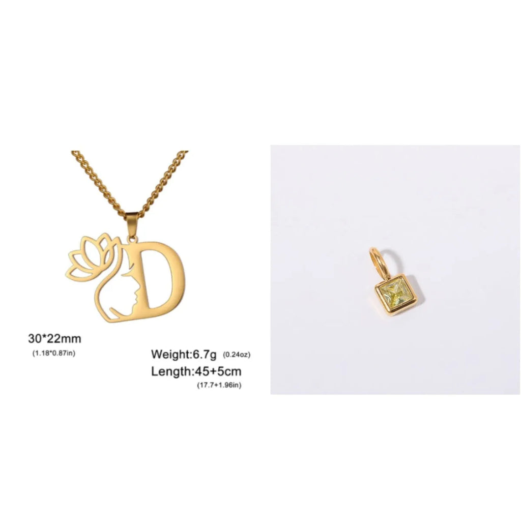 Gold electroplated stainless steel necklace with a cross chain and a letter 'A' pendant on a white background.