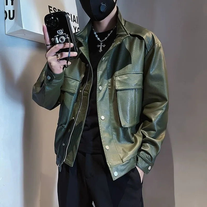 Men's black PU leather pilot jacket with side pockets and a straight hem, shown on a model.
