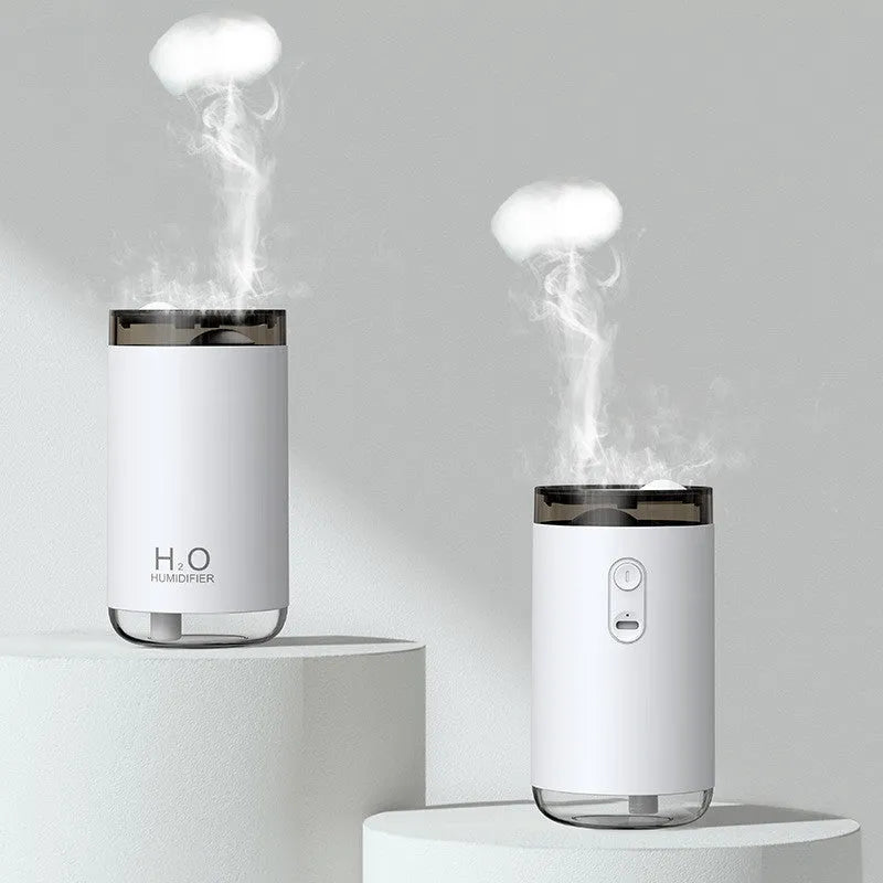 White jellyfish humidifier with USB cable, warm night light, and water mist output