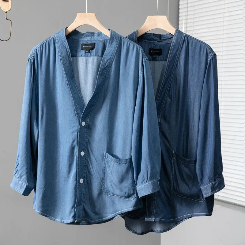 Men's dark blue V-neck denim coat with three-quarter sleeves and loose casual fit