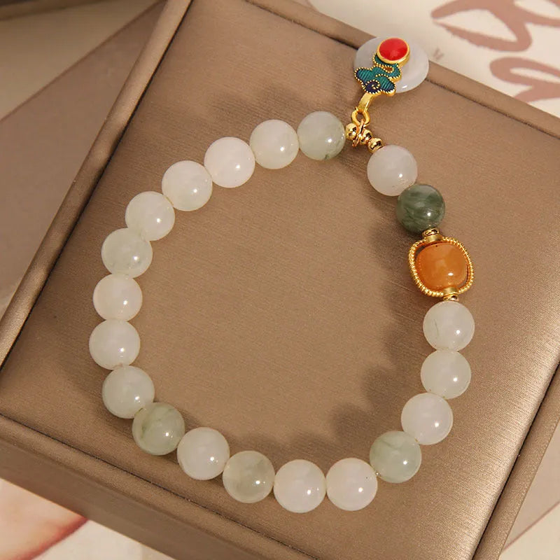 Women's jade crystal bracelet with ice jade colour, xiangyun patterns and pearl decorative elements