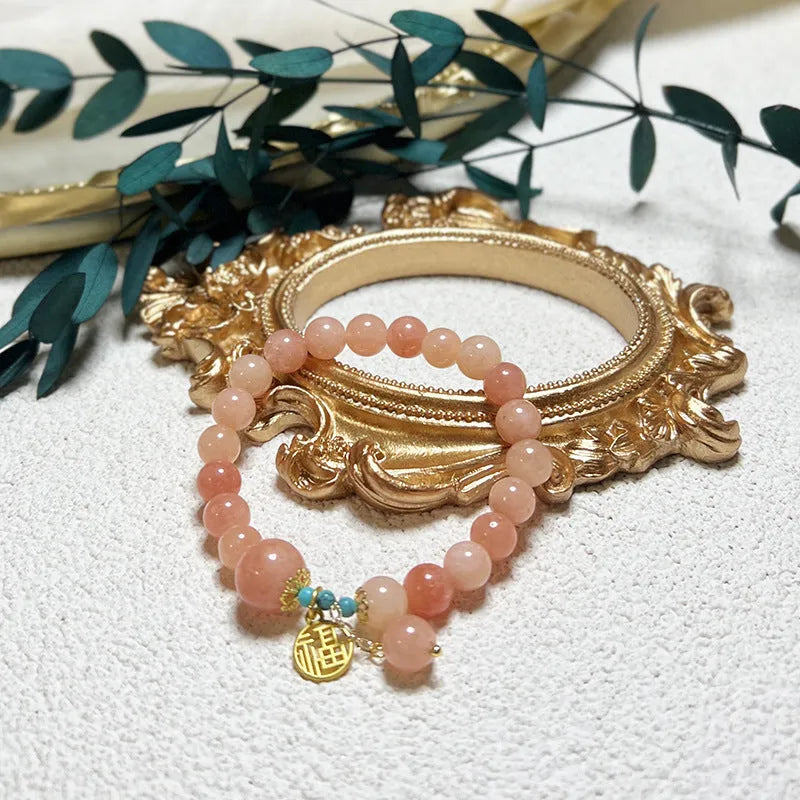 Pink natural stone bracelet on adjustable alloy chain for women, simple jewellery design