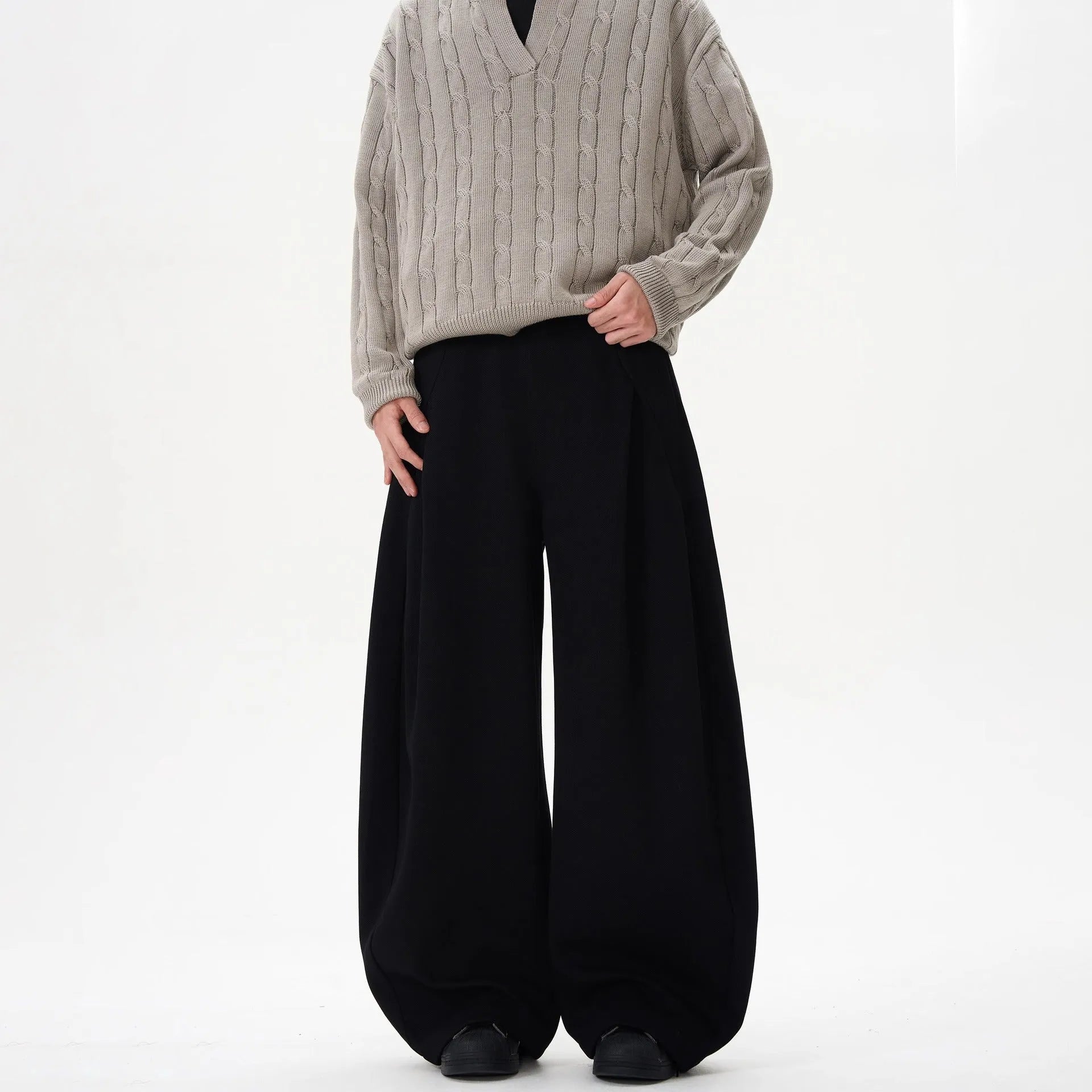Women's black wide-leg polyester trousers with mid waist and retro casual styling