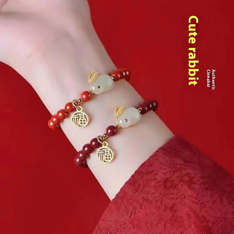 Cinnabar bracelet with jade hare charm and purple gold sand beads in retro style