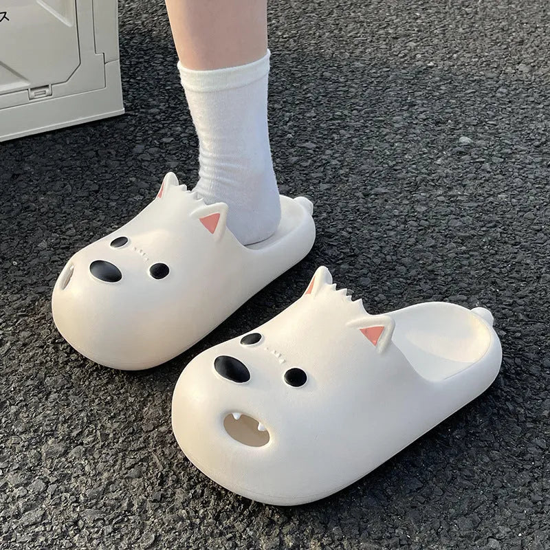 Women's black and white EVA puppy slippers with protective toe cap design