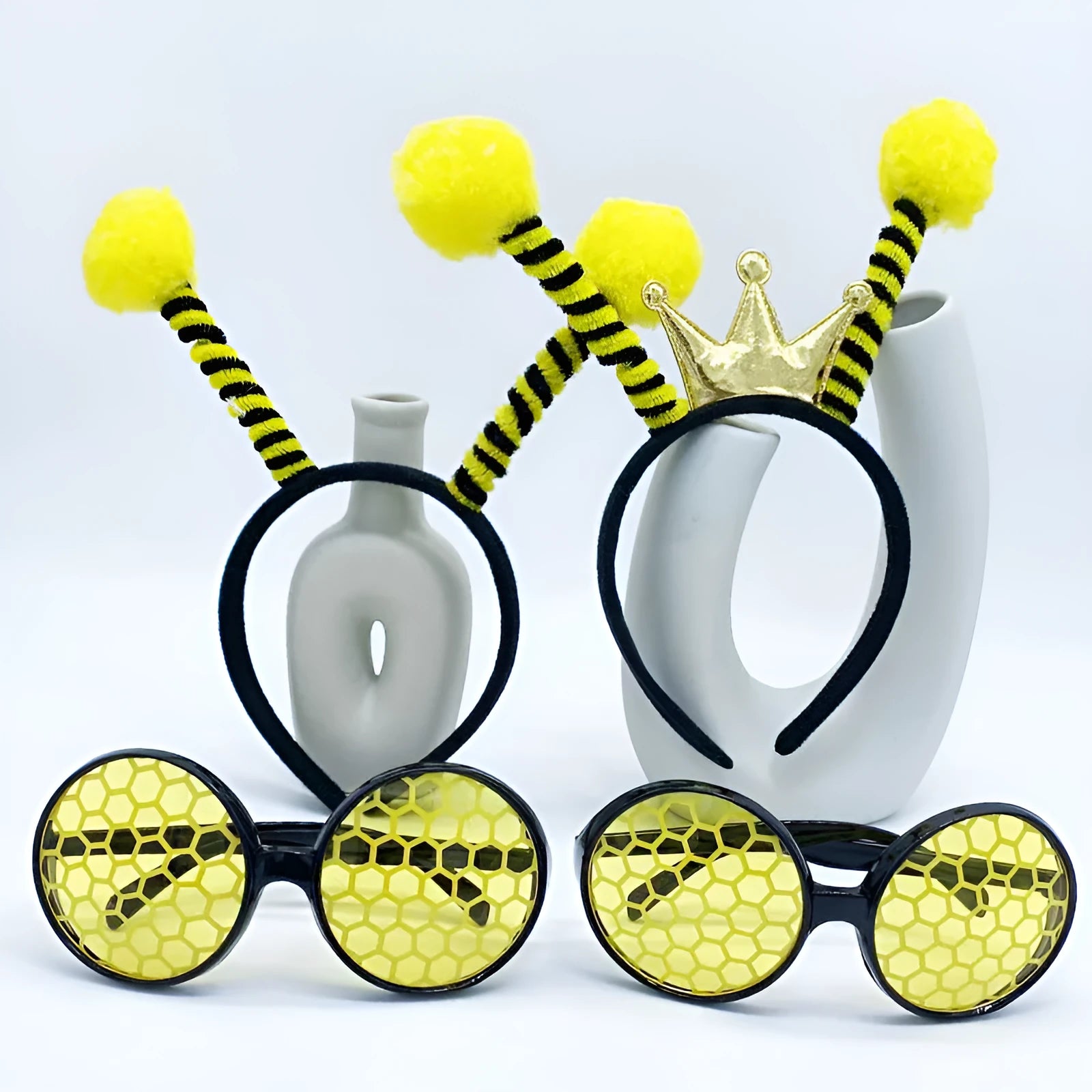 Yellow children's bee costume headband and matching bug-eye glasses for fancy dress parties.