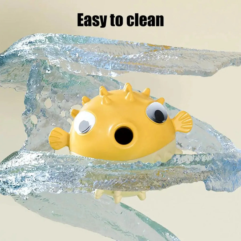 A yellow, fish-shaped durable dog chew toy with a textured surface and built-in squeaker.