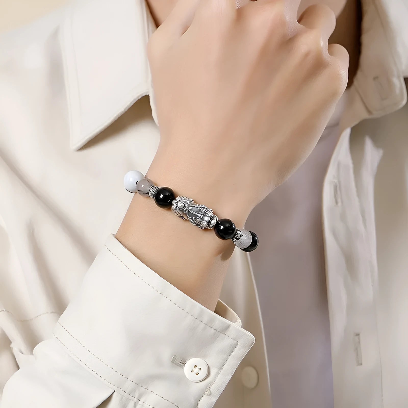 Handmade woven couple bracelet with sterling silver card and animal tassels