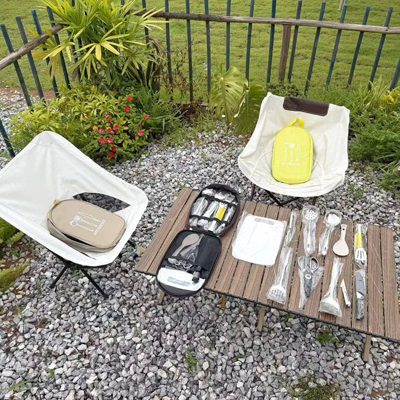 Portable storage bag containing a 12-piece stainless steel picnic cutlery set for outdoor use.
