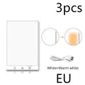 Modern SAD light therapy lamp with touch control and USB interface on simple desk setting