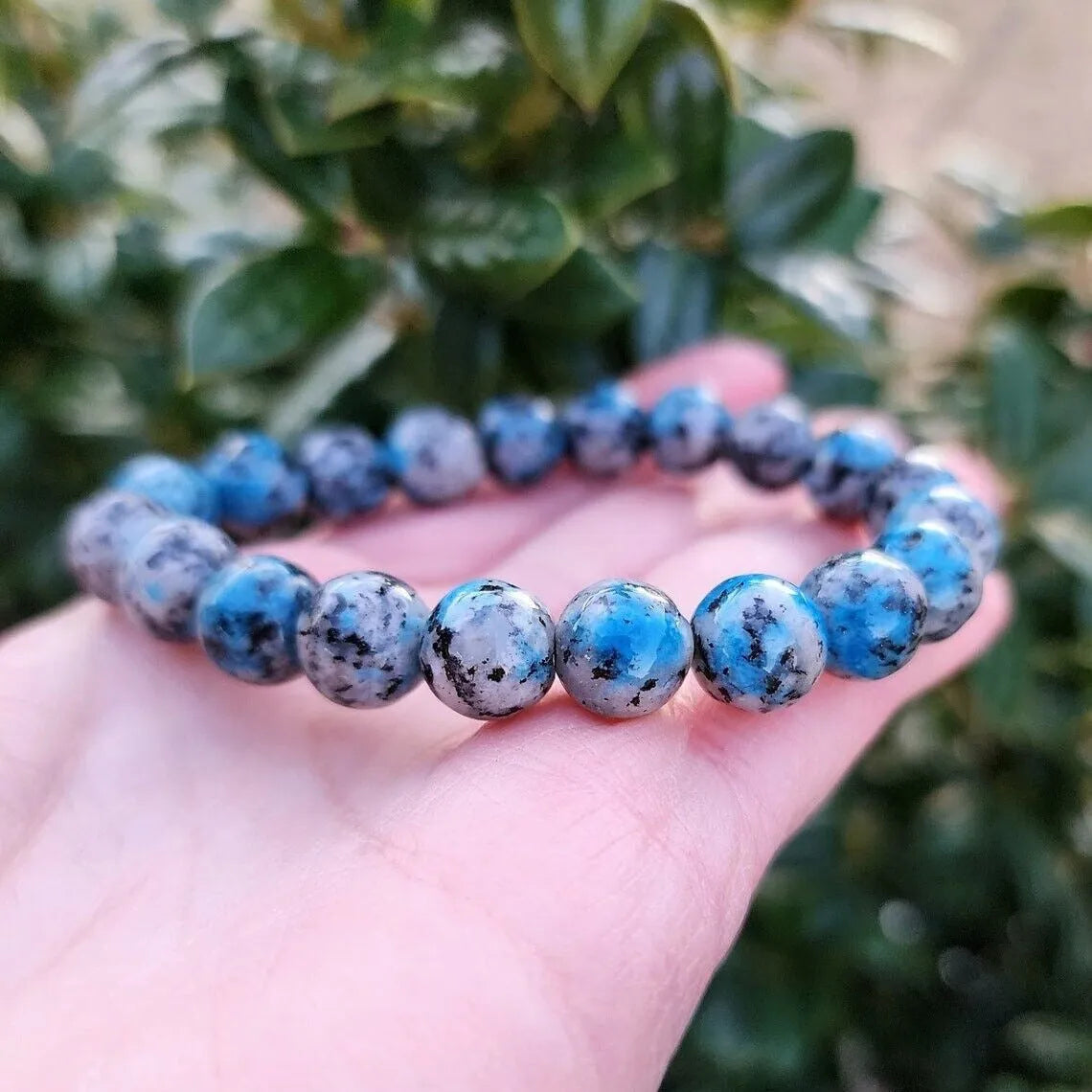 Handmade natural K2 azurite stone beaded bracelet with geometric shape on wrist