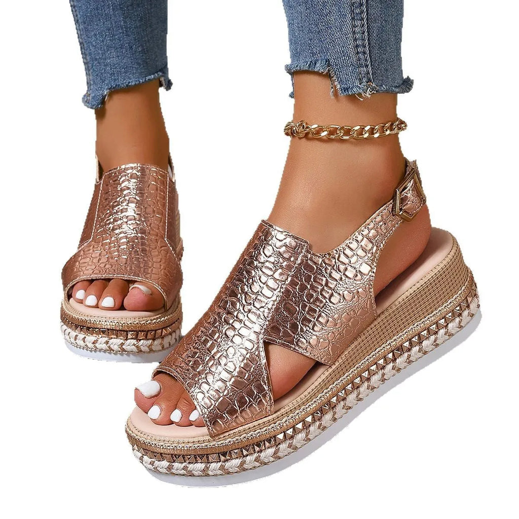 Gold women's Roman sandals with round toe and adjustable ankle buckle.