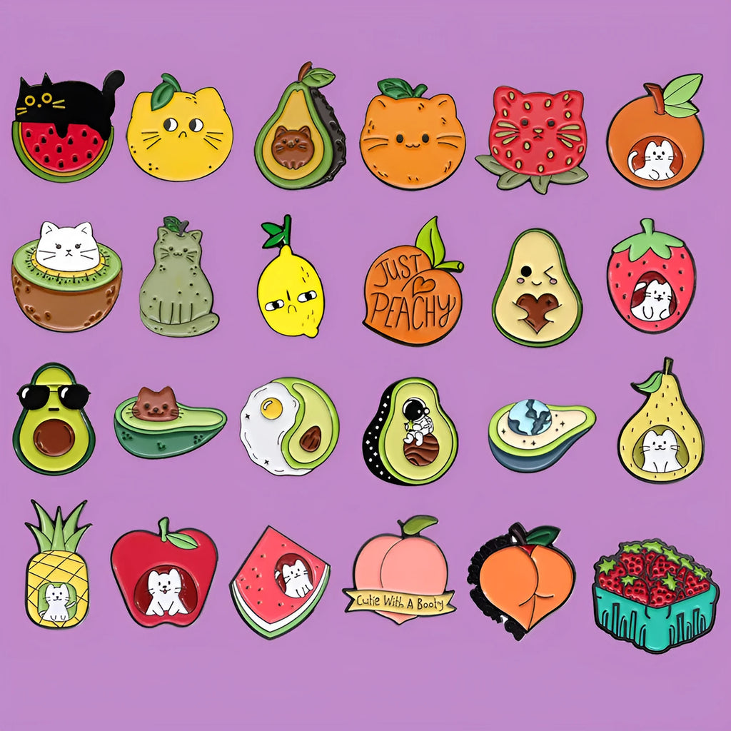 Colourful cartoon-style fruit metal brooch with pin clasp on a denim jacket lapel.