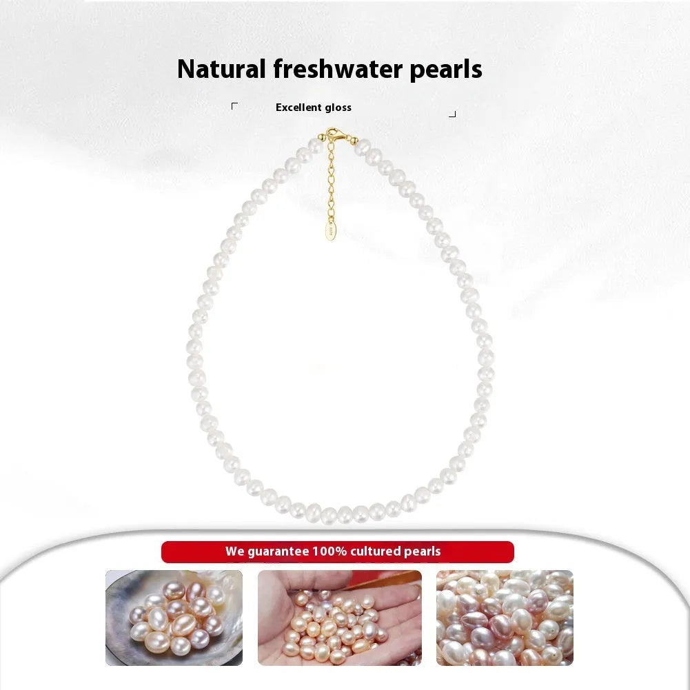 Close-up of a silver adjustable necklace with a single natural freshwater pearl pendant.