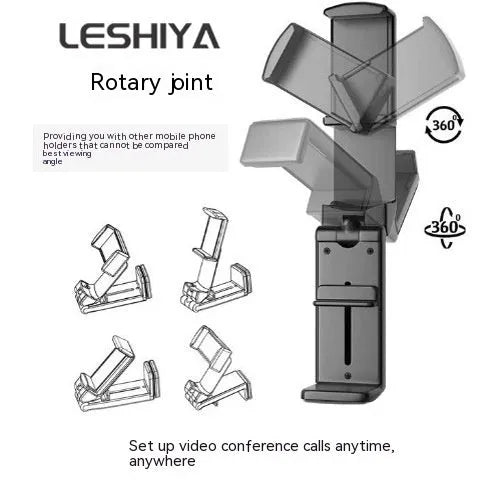 A black foldable rotating lazy phone holder gripping a mobile smartphone on a desk.