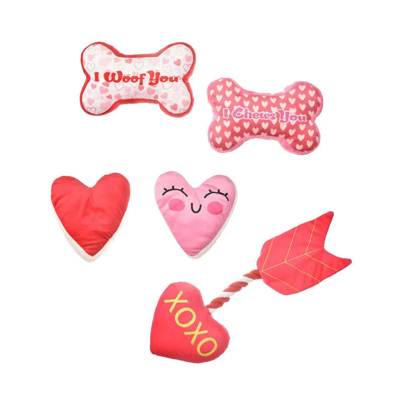 Vocalising plush dog chew toy in peach heart pink colour for dental play and bite resistance.