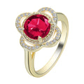 Copper fruit-shaped ring with a zircon stone, shown on a finger.