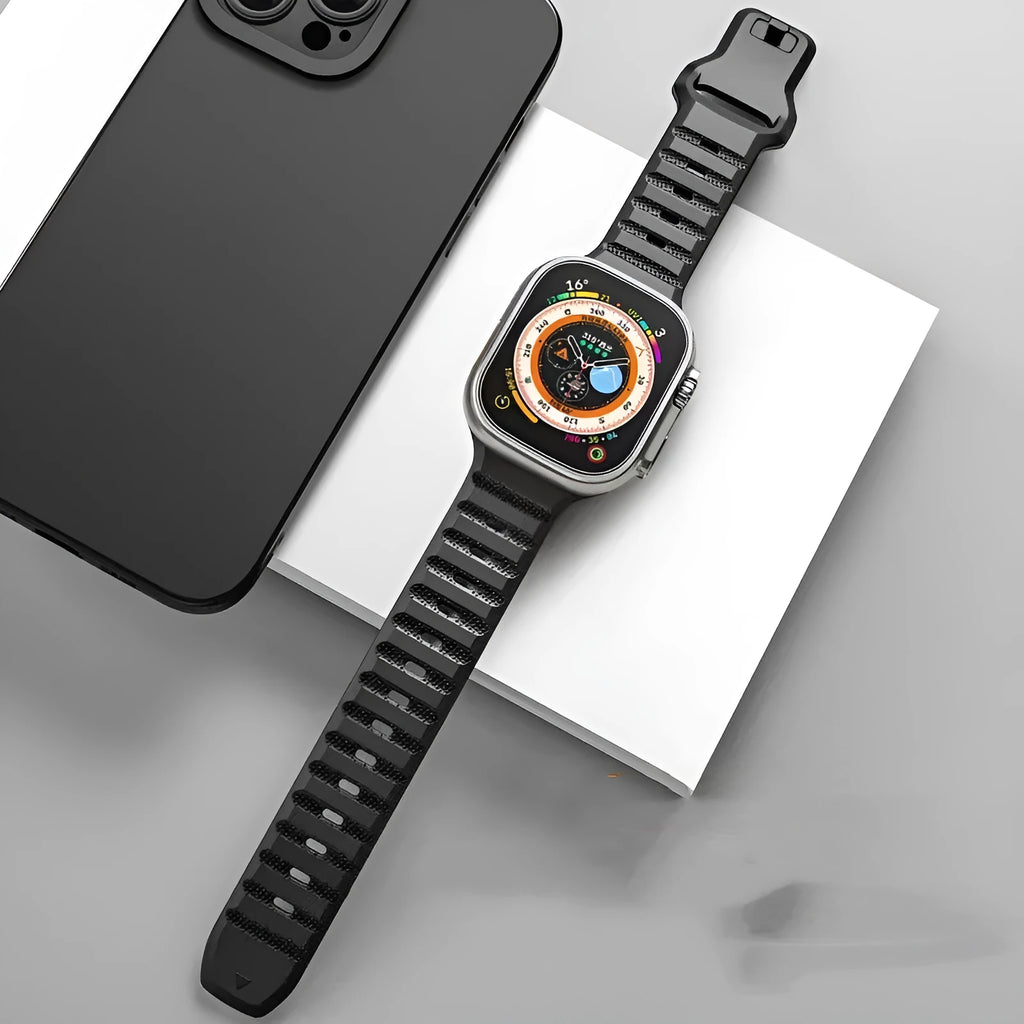 Black fluoro rubber Apple Watch band with T-buckle clasp on a 44mm case