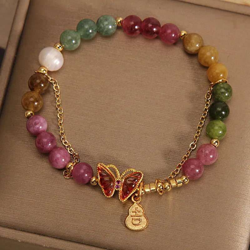 Natural jade coloured tourmaline bracelet with butterfly gourd pendant on adjustable agate bead band