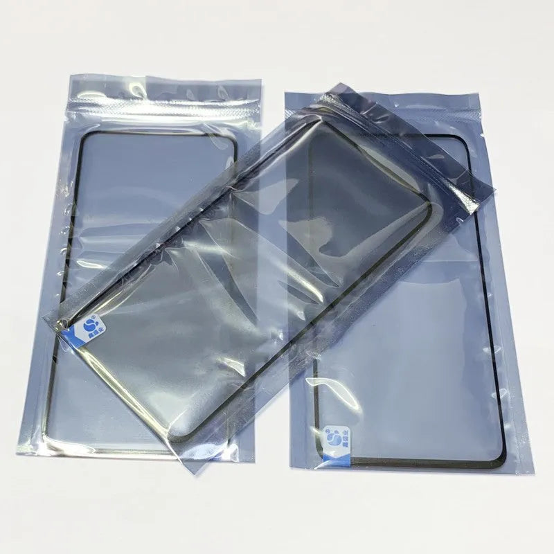 OnePlus 7 Pro replacement touch screen glass with OCA adhesive showing logo positioning markers